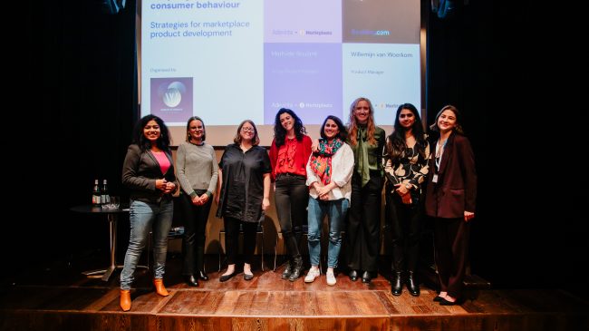 8 women on stage at the Women in Product meetup Amsterdam