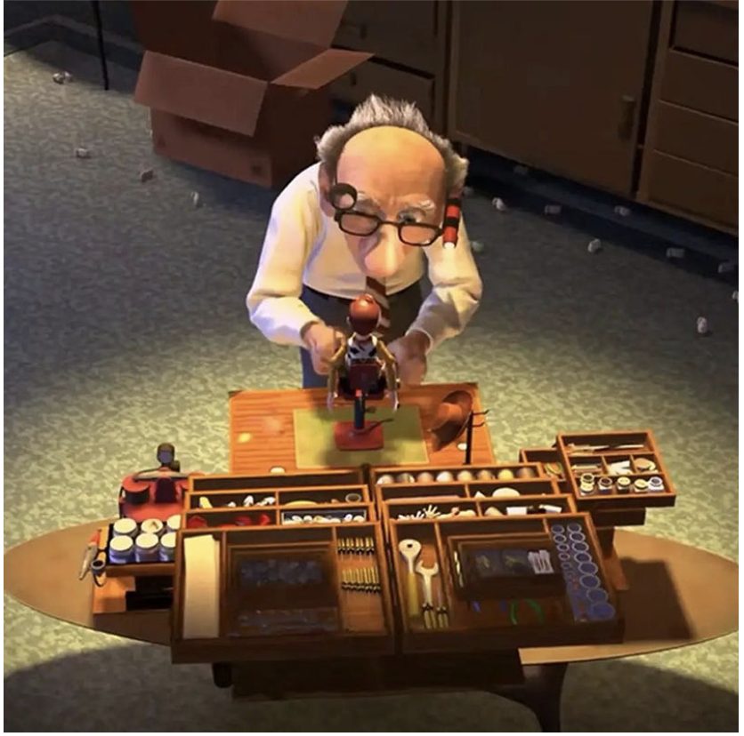 The repairman and his box-turned-into-a-workspace from Toy Story 2